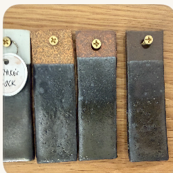An olive glaze test tile